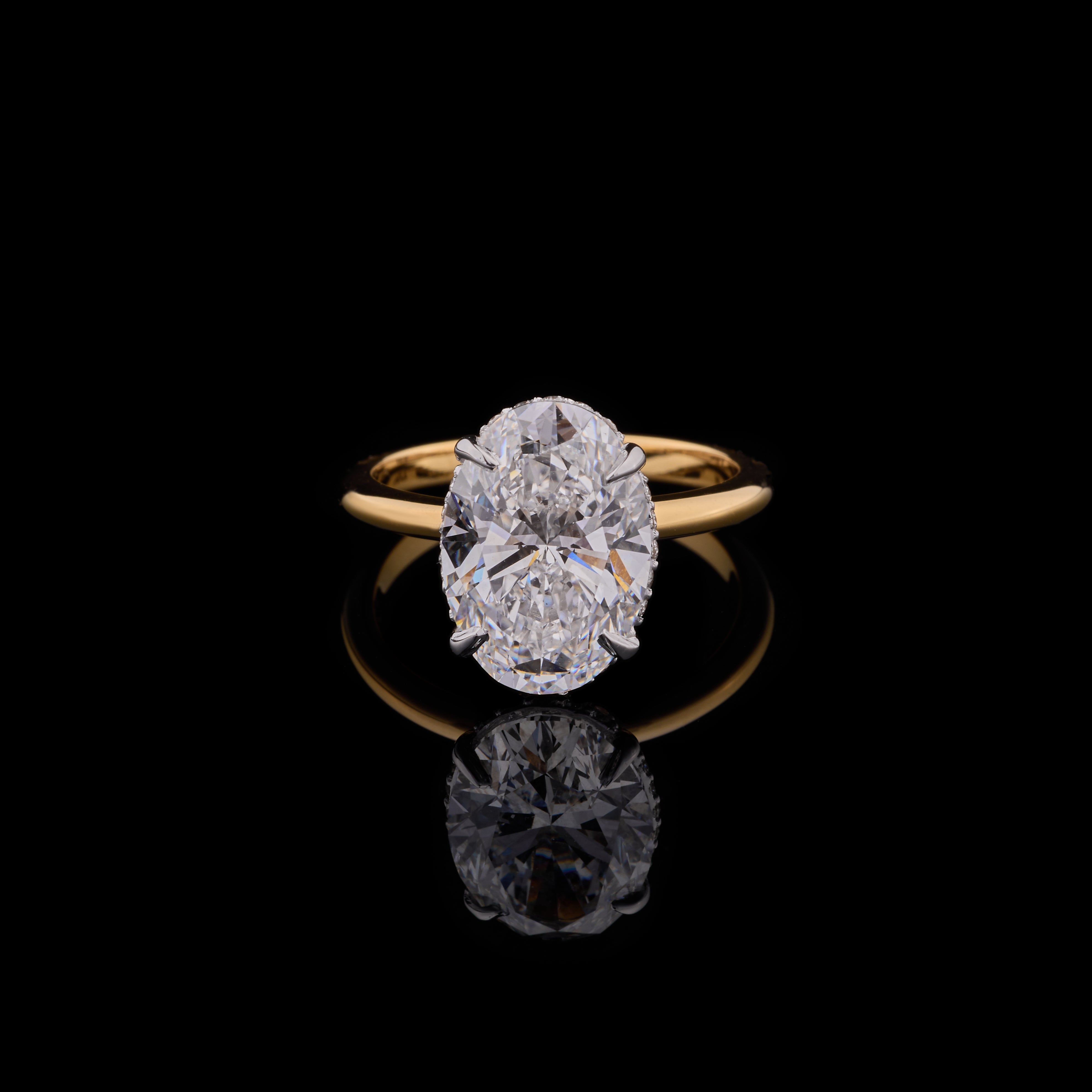 4ct Oval cut 18K Gold ring